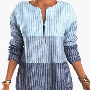 Women's pullover with zip neckline and ribbed surface