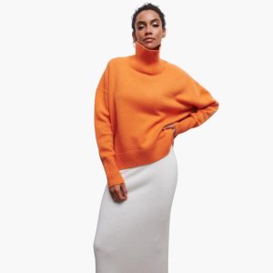 Women's Knitted Sweater with Round Neckline and Ribbed Cuffs